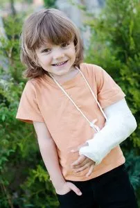 Little girl with a cast on her elbow injury