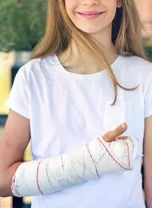Girl with wrist and hand injuries